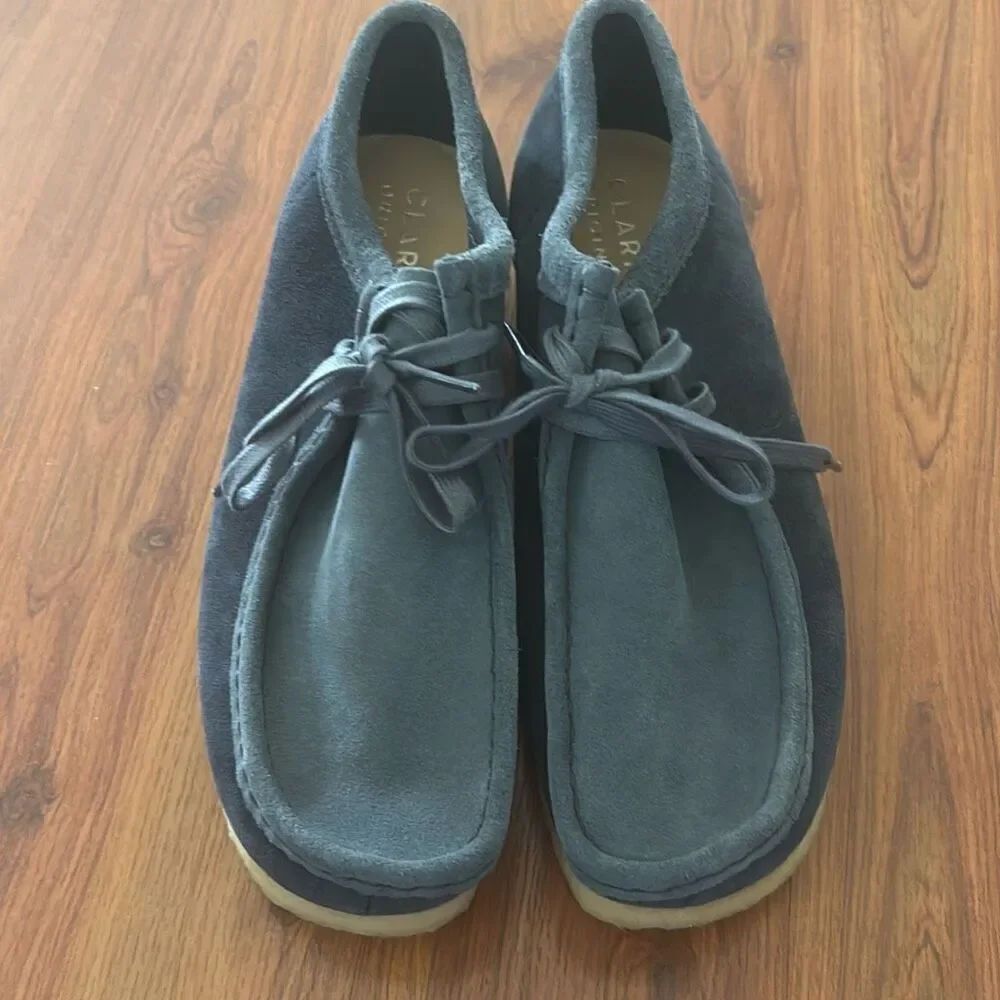 NWT Clarks originals wallabyโshoes blue suede size 8.5